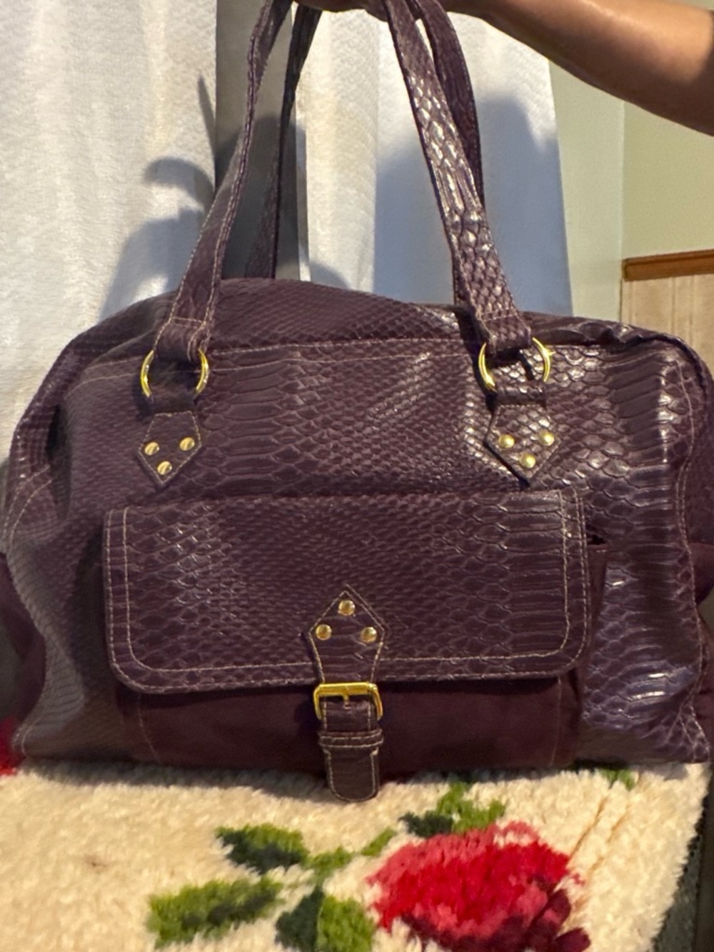 Purple snake skin duffle bag